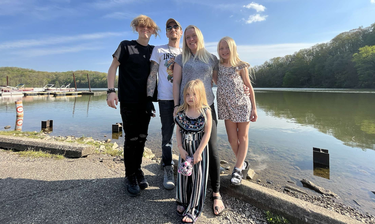 Theresa and her family at a lake